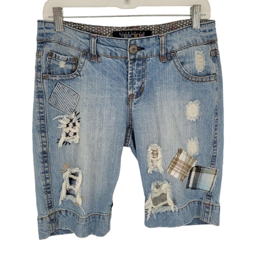 Something Trickie Juniors 7 distressed plaid Patchwork medium wash blue shorts